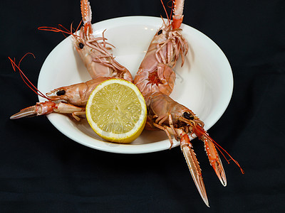 朗古丁海鲜午餐白色红色小龙虾宏观盘子水果文化餐厅背景图片