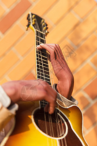 吉他玩家黑色工作室男人音乐家艺术艺术家吉他手字符串娱乐乐队图片