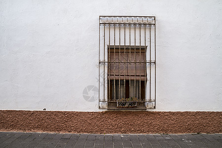 典型的西班牙窗口 白宫墙纸花朵石头建筑小屋英语框架蓝色窗户古董图片