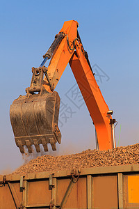 挖掘机搬运工卡车机械反铲工作运输活动挖掘机器矿业图片