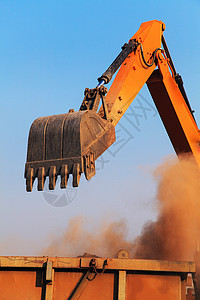 挖掘机装载机机器建筑学土壤行动工作地球金属推土机车辆图片