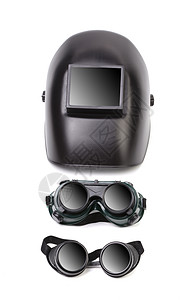 焊接面罩和两副眼镜涂黑危险金属工具玻璃震惊建设性焊机工业塑料图片