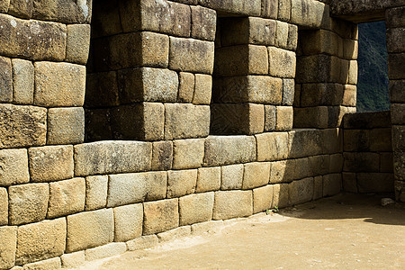 秘鲁安第斯山脉古老的印加城市历史马丘蓝色考古学遗产墙壁天空岩石石头游客图片