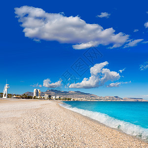 云南景点Alicante西班牙白宝石的海洋环境海浪地标海滩社区白色旅游救生员岩石背景