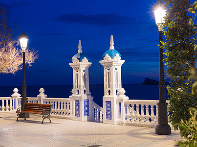 西班牙的Benidorm 夕阳阿利坎特巴尔康地中海蓝色观众海岸线海岸海洋假期地标阳台支撑日落图片