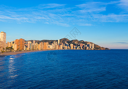 贝尼多姆阿利坎特 西班牙海滩日落白色波浪天际酒店海景旅游晴天城市摩天大楼太阳图片