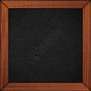 木制棕色框架的黑皮黑色背景图片