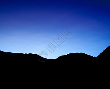 蓝色日落照片岩石调色黑色背景图片