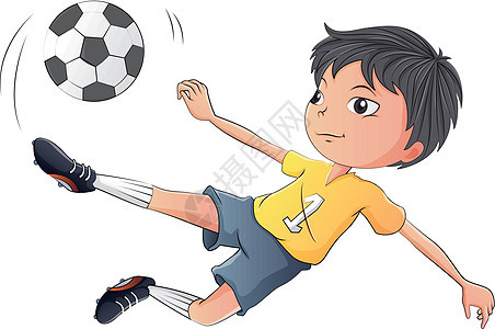 一个小男孩踢足球图片