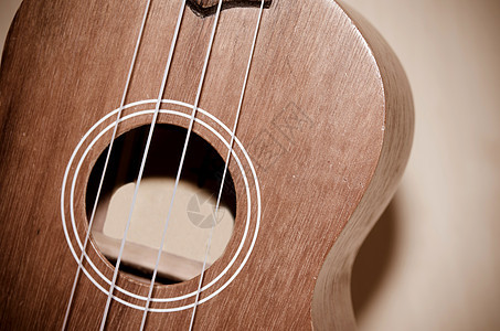 乌库莱莱语Name乐器细绳弦琴棕色乡村国家艺术音乐白色岩石图片