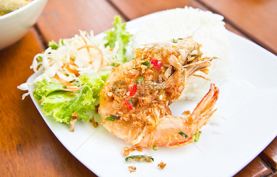 炒辣虾 加茉米大米和蔬菜食物辣椒美食柠檬海鲜对虾饮食盘子贝类胡椒图片