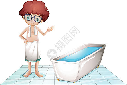 一个带着毛巾的男孩 在浴缸旁边图片