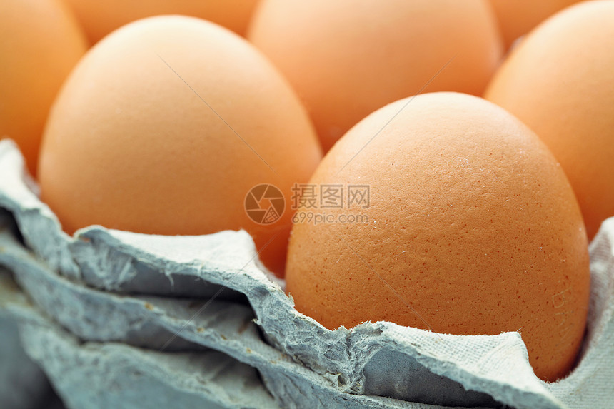 棕蛋早餐黄色食物团体棕色农场白色盒子宏观图片