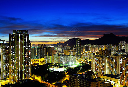 晚上在香港九龙那边建筑学日落风景民众市中心住宅住房狮子公寓城市图片
