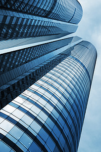 蓝色城市办公大楼低角度视图背景
