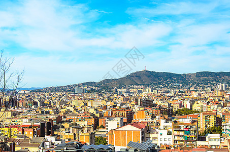 城市巴塞罗纳商业观光建筑学建筑眼睛旅行天空蓝色绿色场景图片