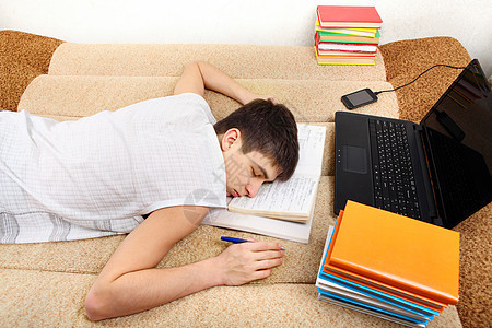 学习后睡觉的青少年工作说谎房间青年家庭作业考试睡眠学生电脑轨枕图片