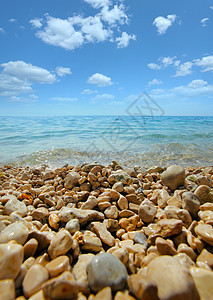 克罗地亚海景天空目的地岩石海浪海岸线海滩阳光场景热带蓝色图片