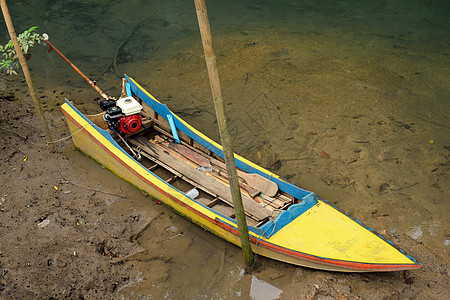 泰国克拉比红树林中传统船的产物热带旅行木头蓝色照片航海太阳场景海滩日出图片