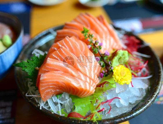Sashimi沙门鱼食物文化鱼片餐厅香菜橙子健康饮食熟鱼绿色海鲜图片