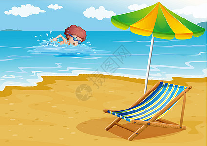 一个男孩在沙滩游泳 带着椅子和雨伞图片