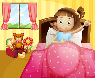 一个女孩躺在床上 带着粉色毯子图片