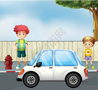 一个男孩和一个孩子在街上 带着一辆车图片