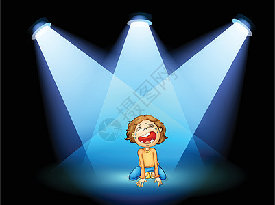 一个女孩在舞台中间哭泣 带着聚光灯图片