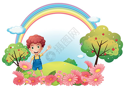 一个男孩在山上 带着彩虹图片