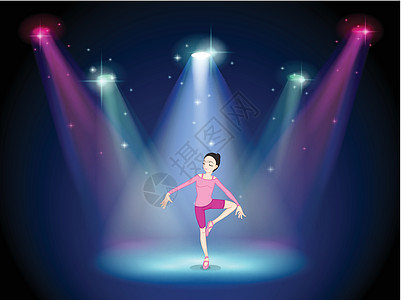 一个女人在舞台上用聚光灯表演芭蕾舞图片