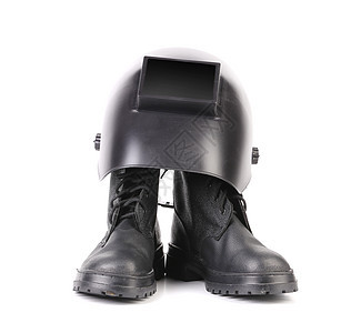 焊接面罩和双靴子工业事故安全建造帽子工具塑料安全帽衣服黑色图片