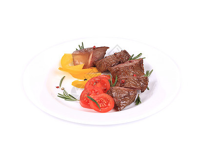 牛排加西红柿和迷迭香食物烧烤盘子鱼片蔬菜用餐腰部牛肉餐厅午餐图片