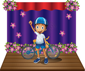 一个男孩和他的自行车 在舞台的正中央图片