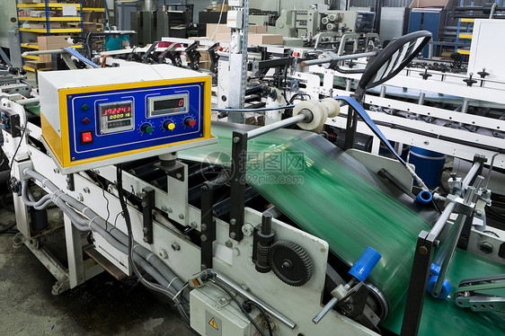 现代印刷厂塑料工作金属机器作坊技术滚筒蓝色打印运动图片