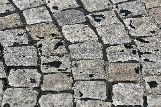 由立方石组成的小可碎石人行道结构背景小路立方体城市街道花岗岩线条铺石人行道材料石头图片