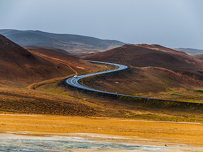 S曲线路橙子爬坡运输曲线天空场景戏剧性旅行黏土沙漠图片