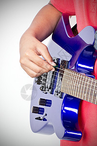在电吉他上演奏音乐家男性岩石乐趣吉他手音乐摇杆孩子吉他乐器图片
