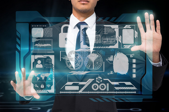 商务人员与图形的触摸界面男性数字蓝色计算机夹克绘图电脑人士互动商业图片