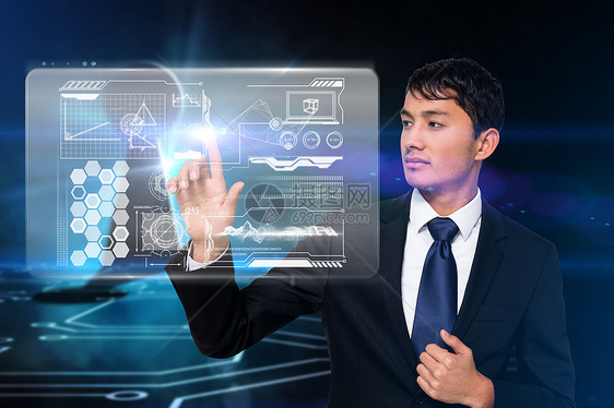认真的商务人士触摸界面计算商业蓝色男性套装未来派专注数字科技混血图片
