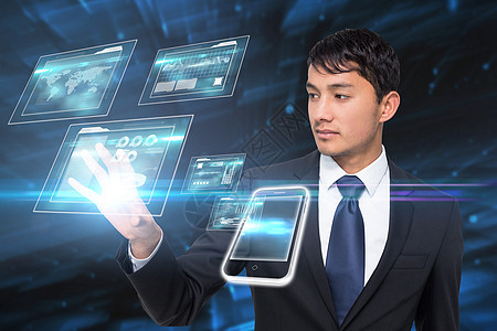 亚洲商务人士触摸界面商务绘图蓝色领带套装专注电脑科技男人技术图片