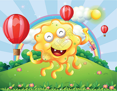 一个快乐的黄黄怪物 在山顶上 带着彩虹和漂浮图片