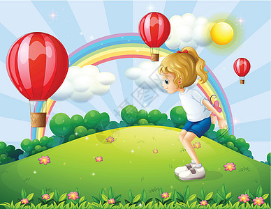 一个女孩在山上玩 与漂浮气球图片