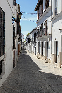 西班牙安达卢西亚奥苏纳街车道旅行旅游白色街道鹅卵石房屋历史性粉饰建筑学图片