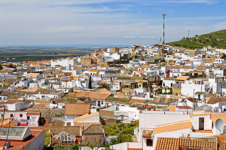 西班牙安达卢西亚奥苏纳屋顶旅游旅行建筑物房屋爬坡道山坡白色家园全景粉饰图片