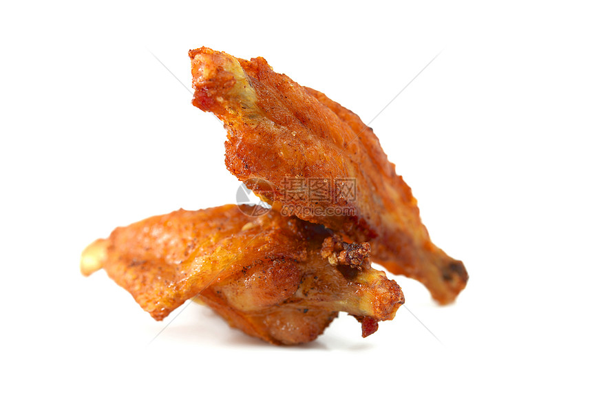 炸鸡翼宏观油炸鸡翅影棚翅膀食物白色小吃鸡腿胡椒图片