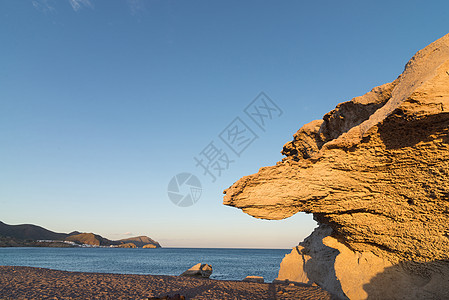 下午1时在卡博德加塔午光塔角自然公园海岸火山海滩水平岩石海岸线图片