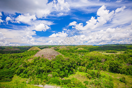 菲律宾Bohol的绿色异寻常巧克力山情调邦劳地平线丛林旅游全景热带爬坡森林天空图片
