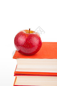 带有红苹果的堆叠书艺术教育小说页数文学阅读白色红色图片