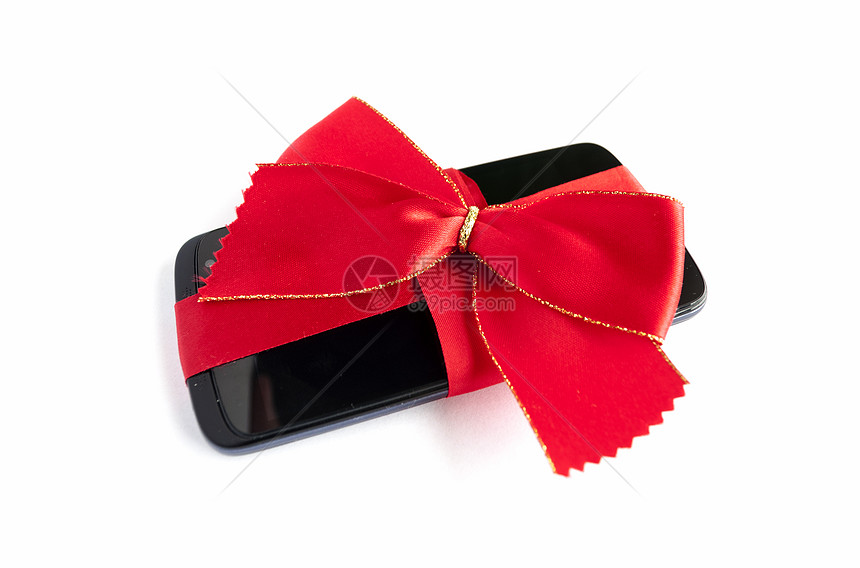 与红丝带和Bow隔离的智能电话机动性展示工具白色触摸屏细胞礼物导航手机技术图片