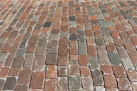 旧石块铺路街路路历史性地面街道铺路中心灰色大街岩石网格材料图片